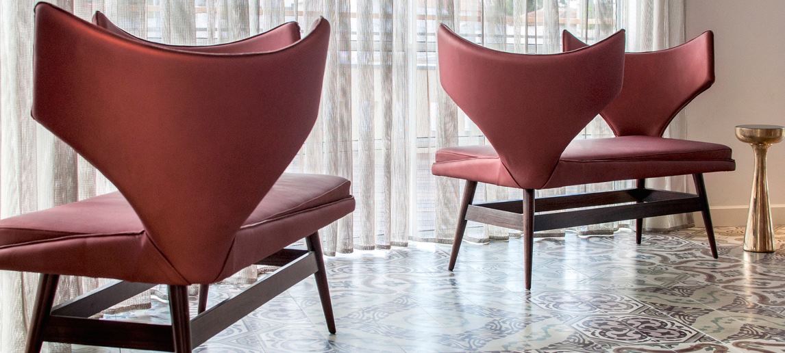 Red armchair at The Norman Hotel